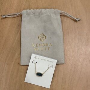 Kendra Scott Gold Necklace with Deep Blue Stone